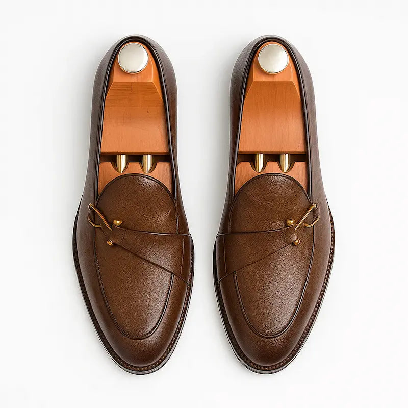 Men's slip-on loafers with metal vamp trim and low heels