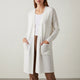 Women's long open front cardigan with long sleeves and patch pockets