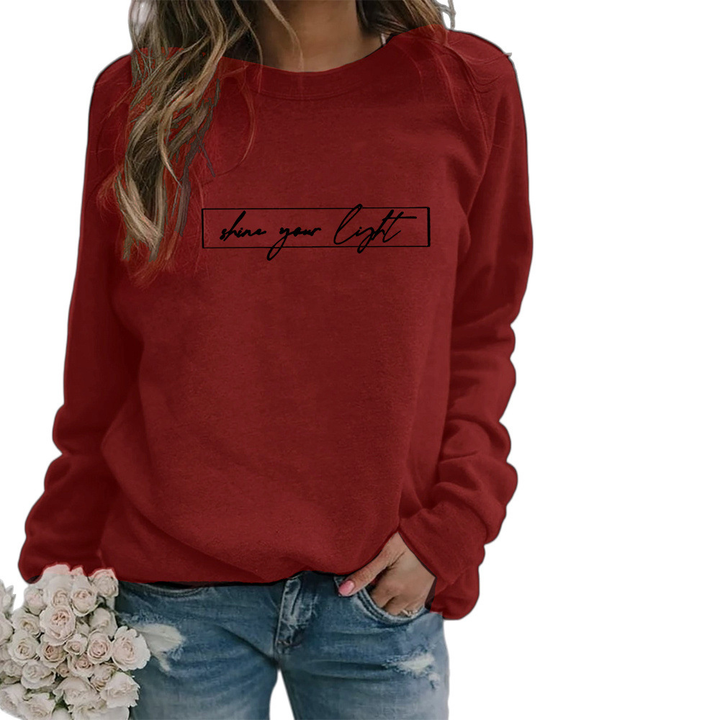 Women's crew-neck sweatshirt with framed shine your light text print