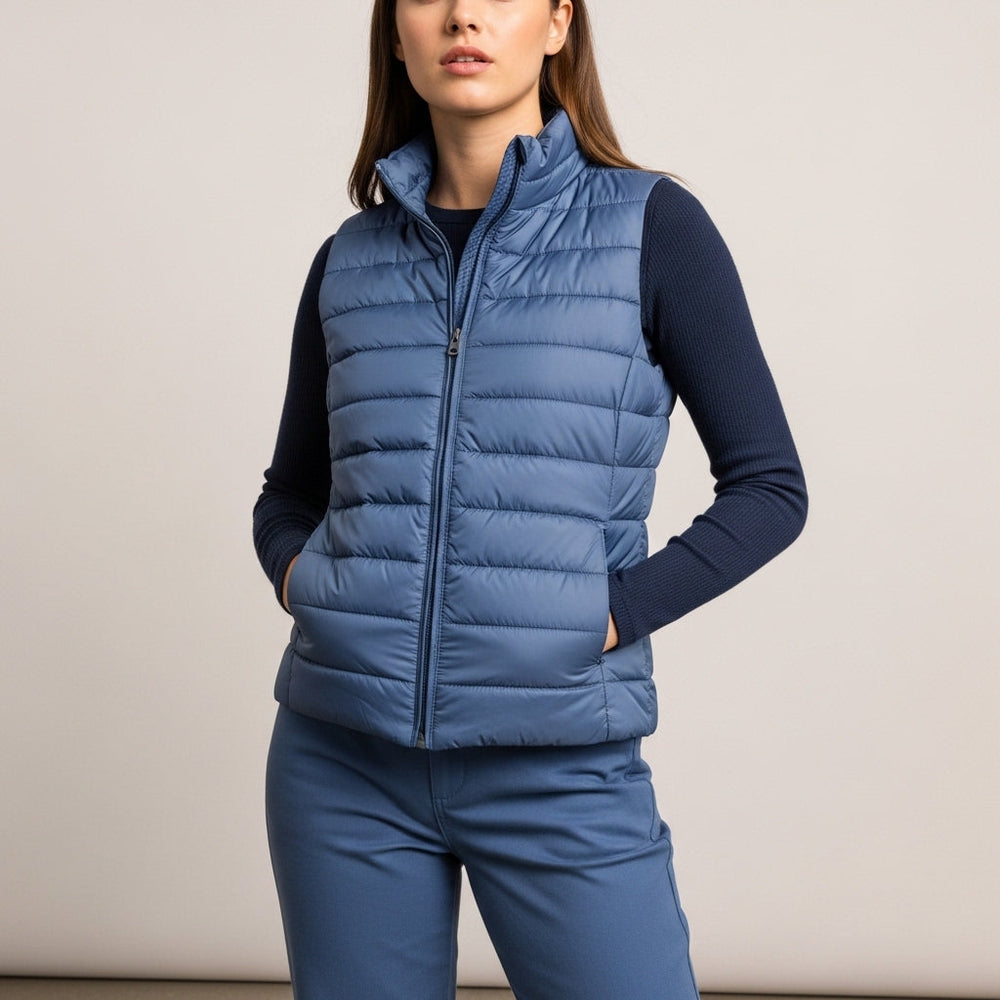 Women's quilted sleeveless puffer vest with stand collar and front zip
