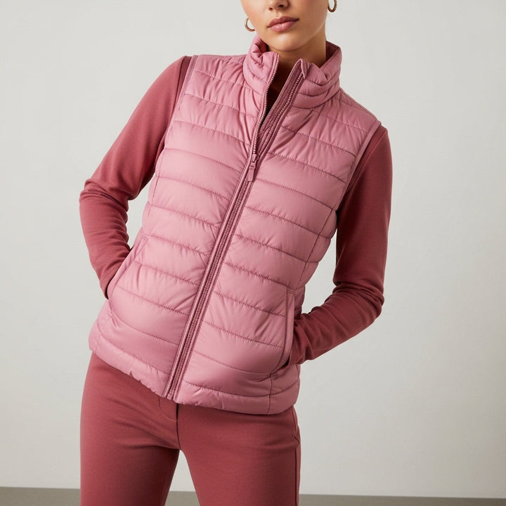 Women's quilted sleeveless puffer vest with stand collar and front zip