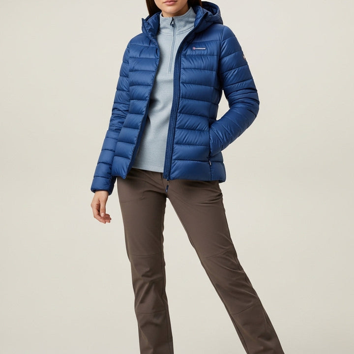 Women's quilted jacket with stand collar, long sleeves and zipped pockets