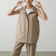 Women's sleeveless hooded utility vest with zip front and side pockets
