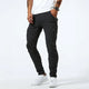 Men's tapered cargo jeans with multiple thigh pockets and panel detailing