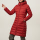 Women's quilted jacket with stand collar, long sleeves and zipped pockets