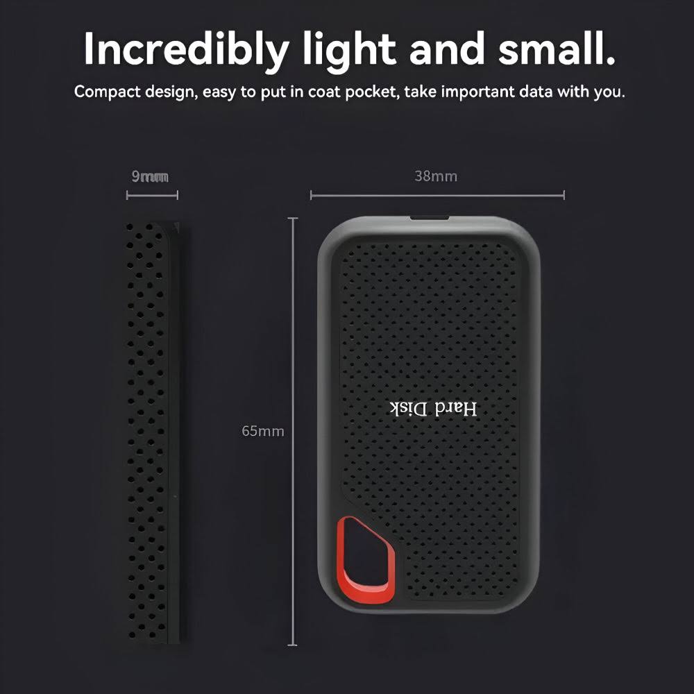 Black portable external SSD with red carry handle and USB cable