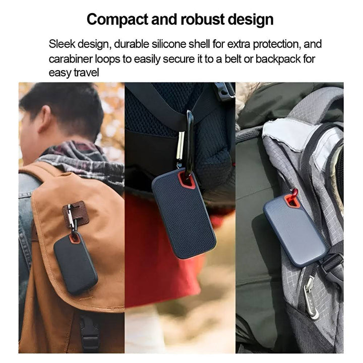 Black portable external SSD with red carry handle and USB cable