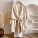 Long tie front poncho scarf with open V-neckline and short cape sleeves