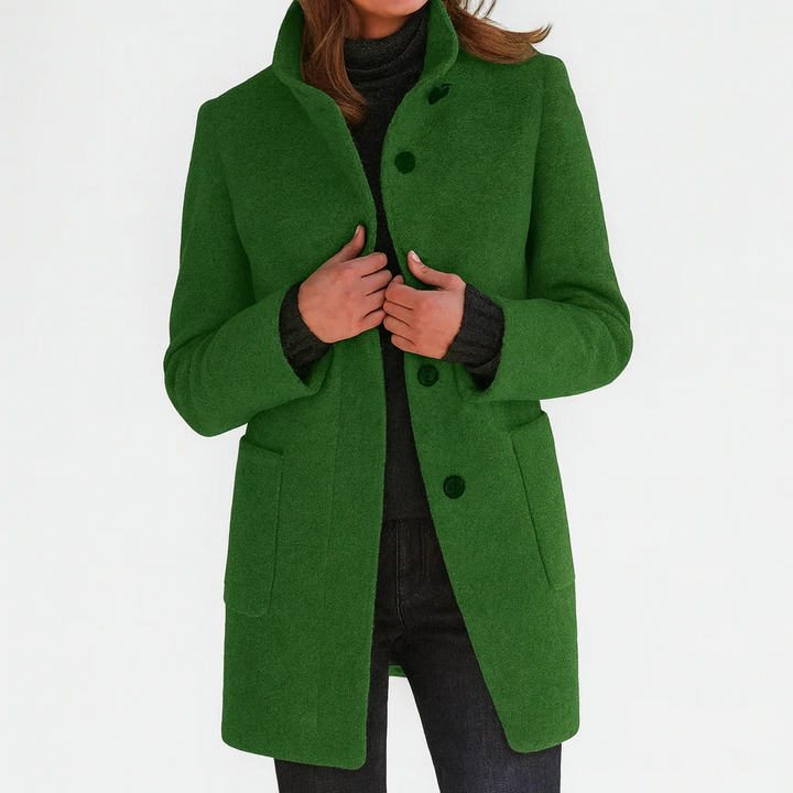 Women's long button-front coat with raised collar and front patch pockets