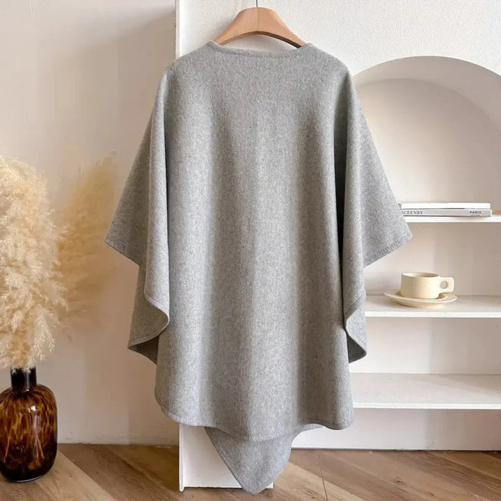 Long tie front poncho scarf with open V-neckline and short cape sleeves