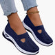 Women's textured slip-on sneakers with front cutout and ridged soles