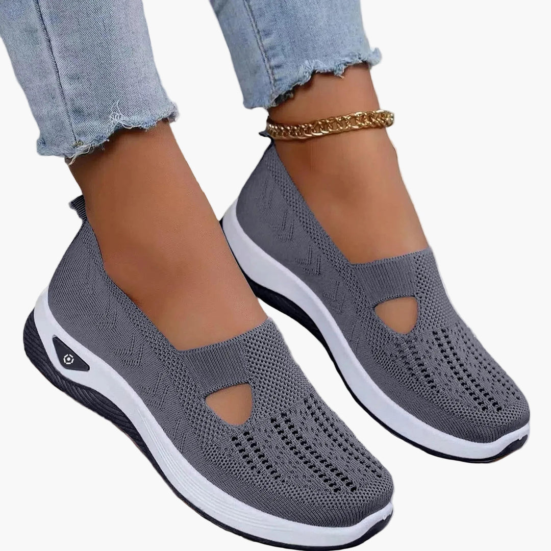Women's textured slip-on sneakers with front cutout and ridged soles