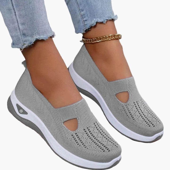 Women's textured slip-on sneakers with front cutout and ridged soles