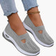 Women's textured slip-on sneakers with front cutout and ridged soles