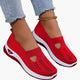 Women's textured slip-on sneakers with front cutout and ridged soles