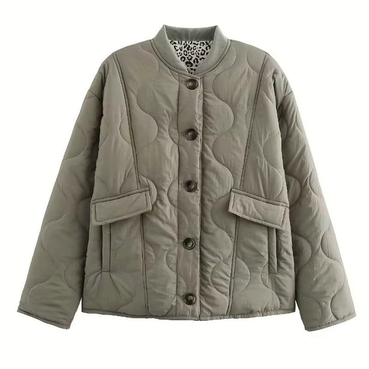 Women's quilted jacket with button front and animal-print cuffs