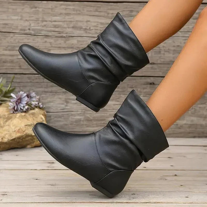 Women's slouch mid-calf boots with rounded toes and low wedge heels