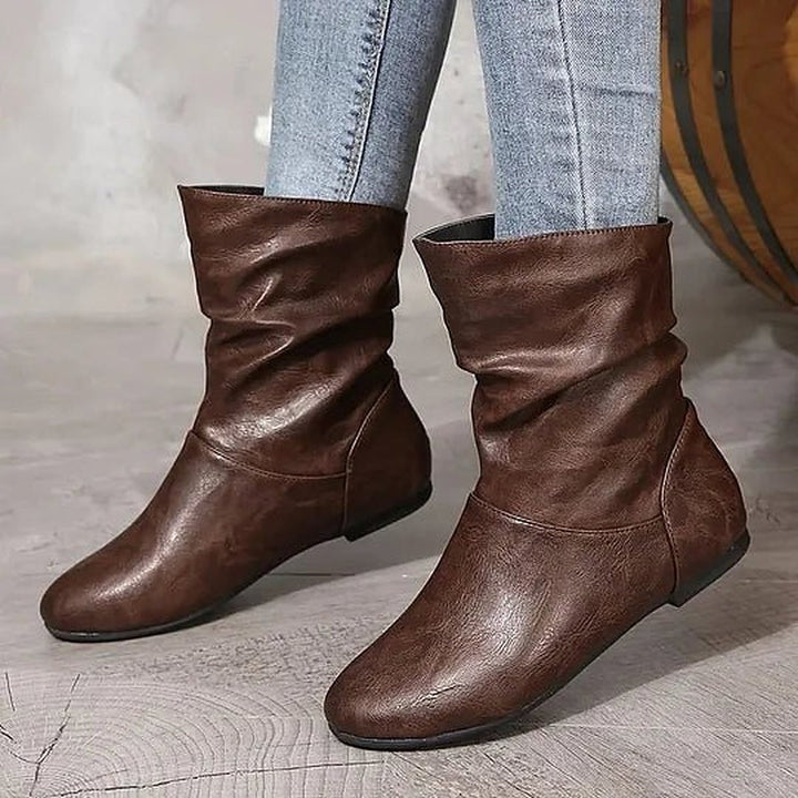 Women's slouch mid-calf boots with rounded toes and low wedge heels