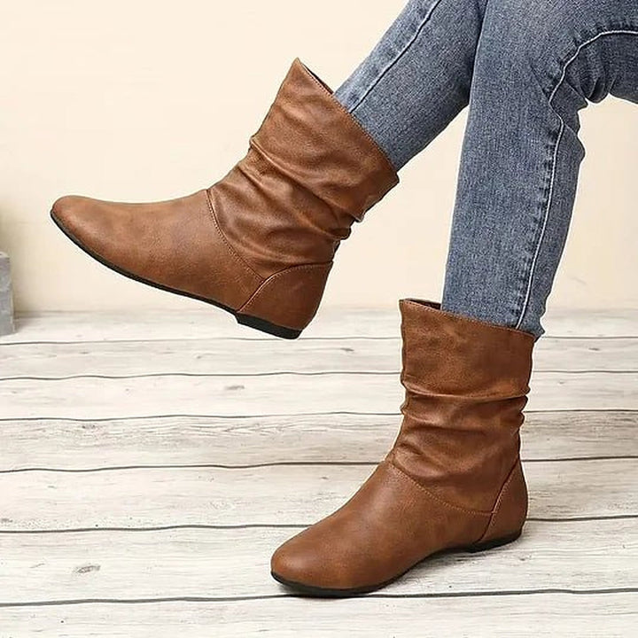 Women's slouch mid-calf boots with rounded toes and low wedge heels
