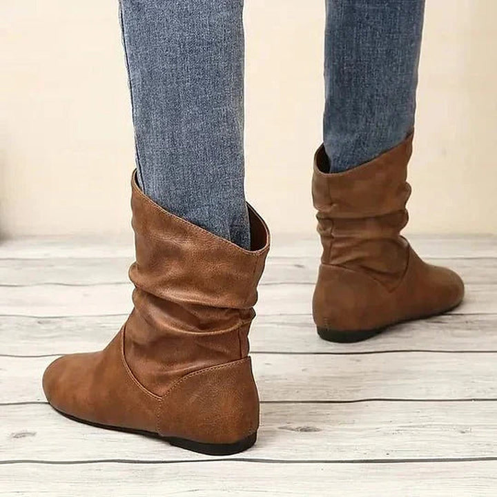 Women's slouch mid-calf boots with rounded toes and low wedge heels