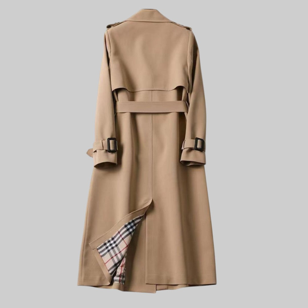 Women's long belted double-breasted trench coat with lapel collar and buckle cuffs
