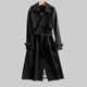 Women's long belted double-breasted trench coat with lapel collar and buckle cuffs