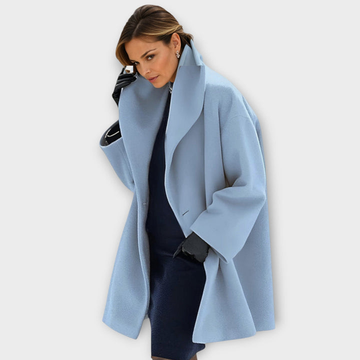 Women's long coat with high collar and button front