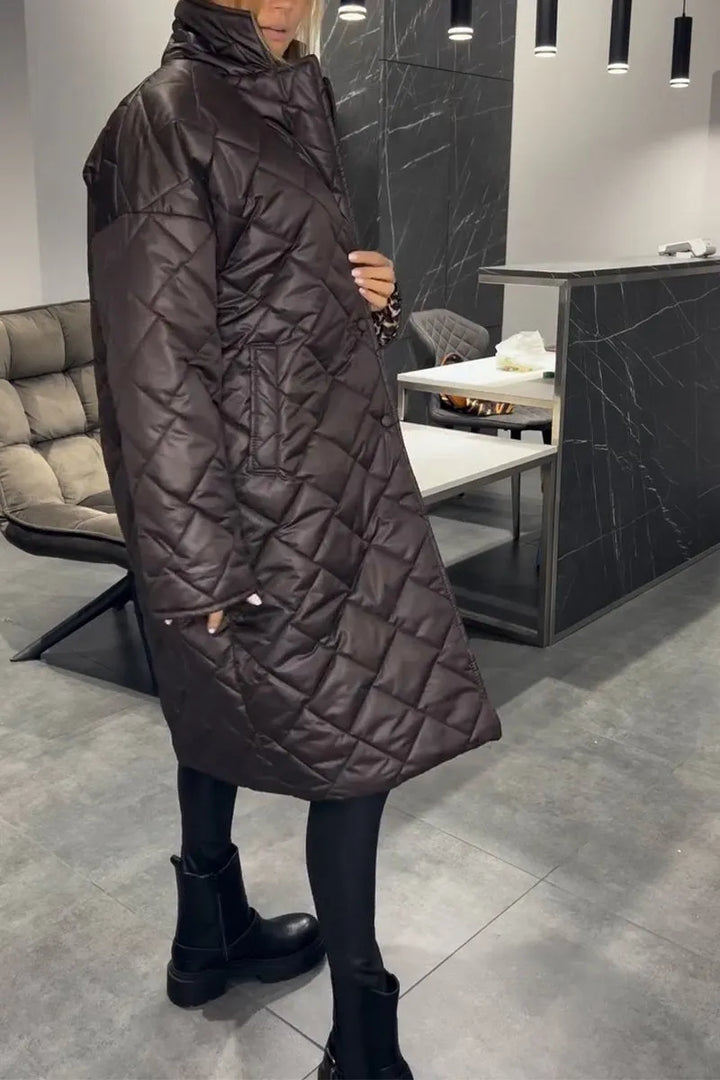 Women's longline quilted coat with diamond stitching and lapel collar