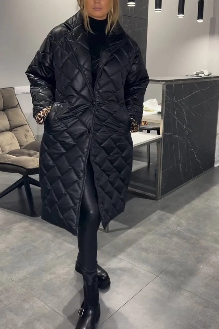 Women's longline quilted coat with diamond stitching and lapel collar
