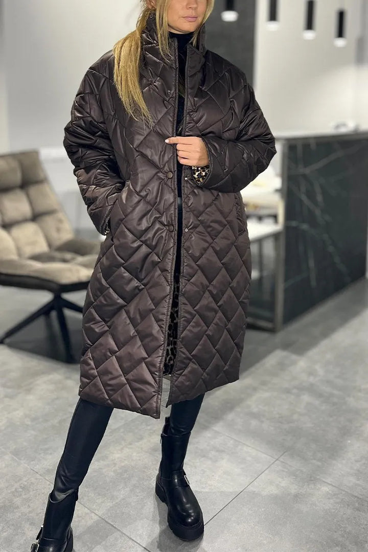 Women's longline quilted coat with diamond stitching and lapel collar
