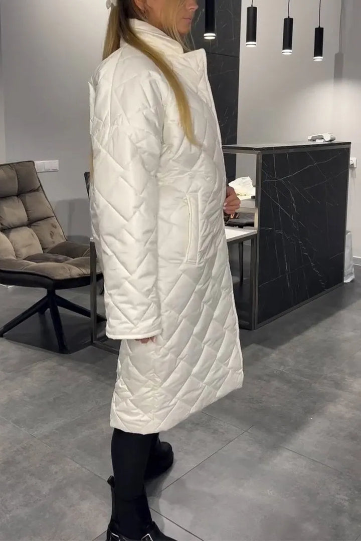 Women's longline quilted coat with diamond stitching and lapel collar