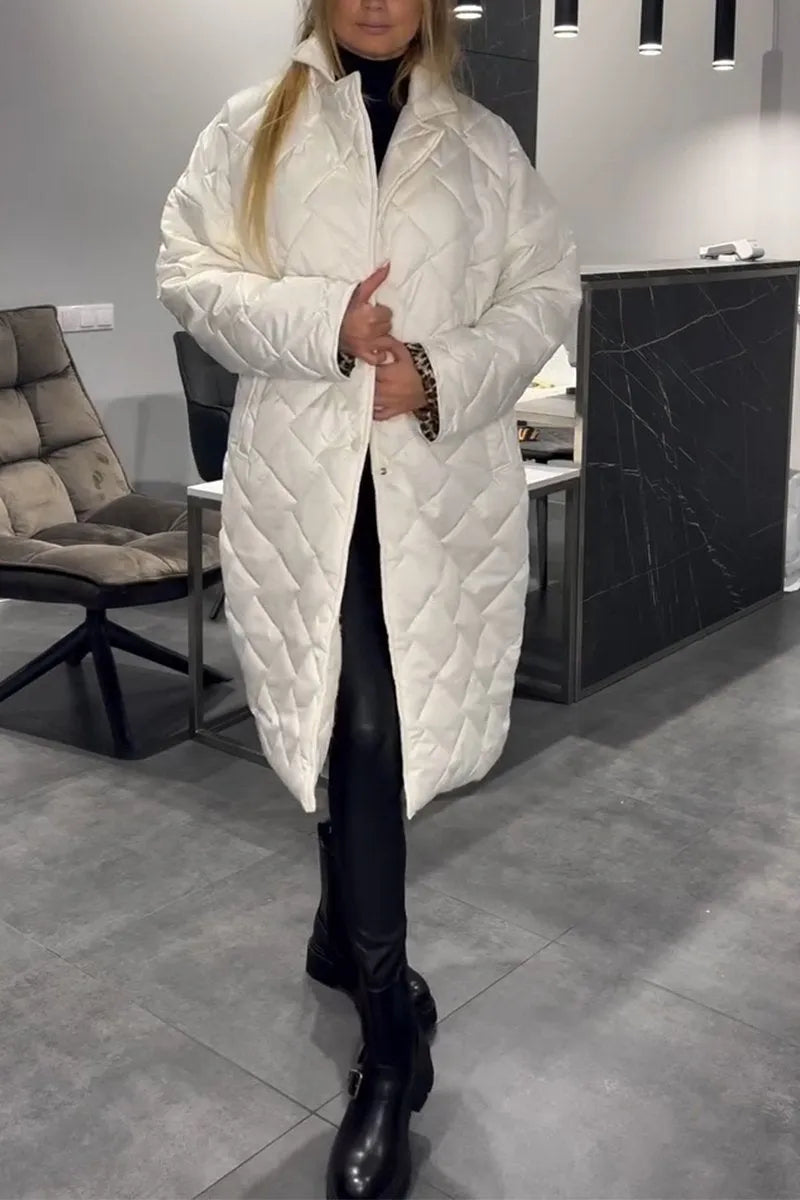 Women's longline quilted coat with diamond stitching and lapel collar
