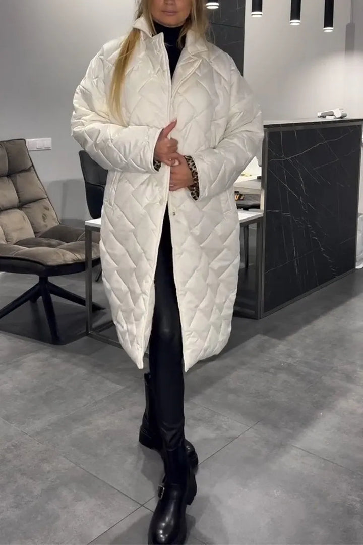 Women's longline quilted coat with diamond stitching and lapel collar