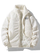 Ribbed puffer jacket with high collar and zip front