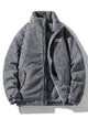Ribbed puffer jacket with high collar and zip front