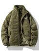 Ribbed puffer jacket with high collar and zip front