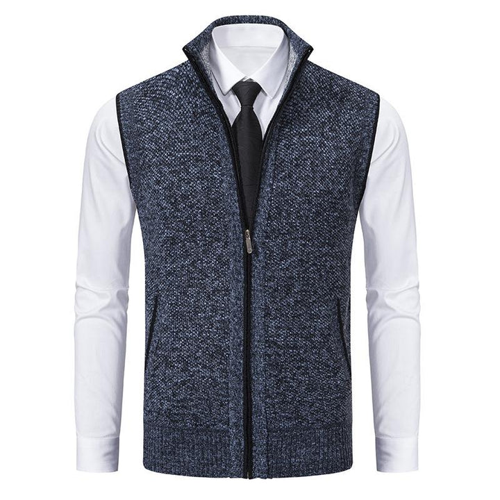 Sleeveless fleece vest with high neck zip front and pockets