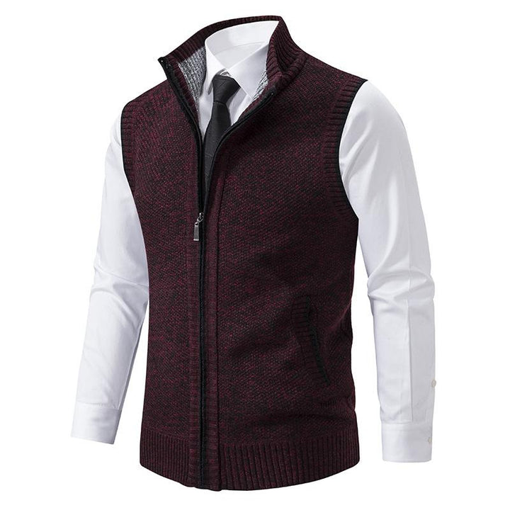 Sleeveless fleece vest with high neck zip front and pockets