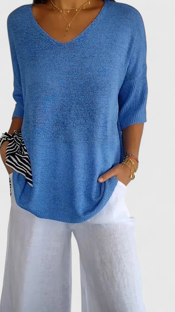 Women's textured V-neck sweater with three-quarter sleeves