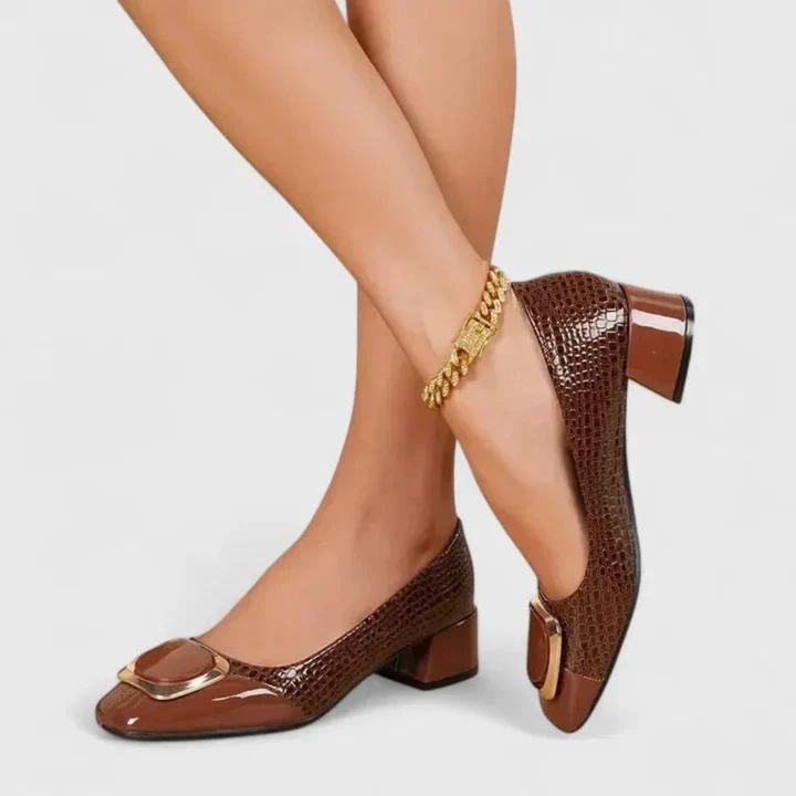 Women's embossed pointed-toe loafers with block heels and gold-tone ornament