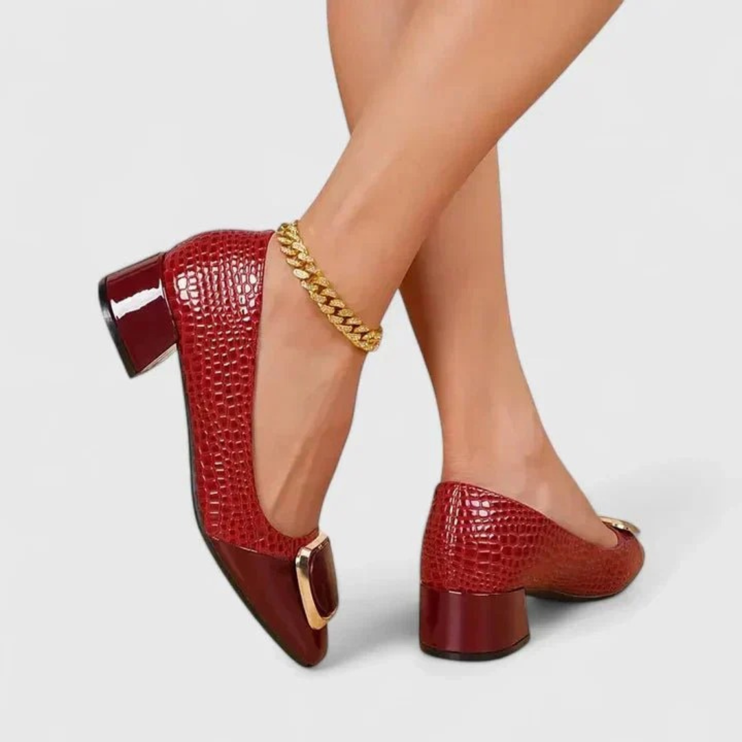 Women's embossed pointed-toe loafers with block heels and gold-tone ornament