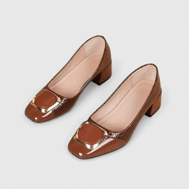 Women's embossed pointed-toe loafers with block heels and gold-tone ornament