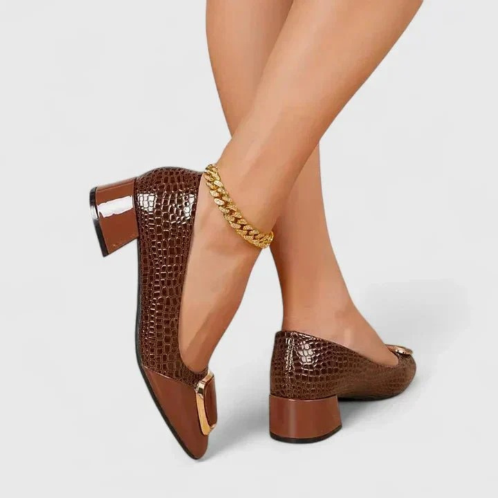 Women's embossed pointed-toe loafers with block heels and gold-tone ornament