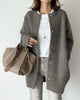 Women's longline button-front cardigan shown in beige and green