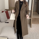 Women's long double-breasted coat with notched lapels