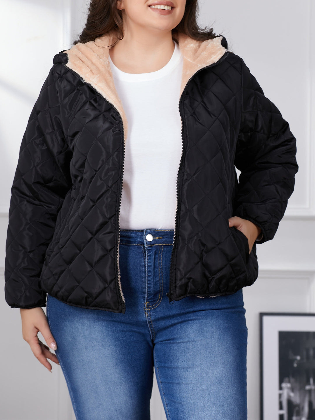 Women's plus size black quilted hooded jacket with zip front