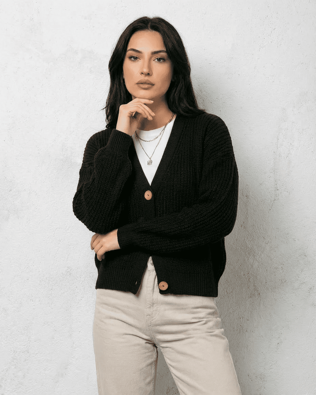 Women's black ribbed knit cardigan with V-neck and button front