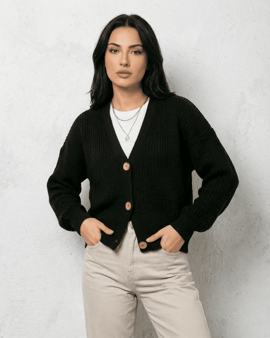 Women's black ribbed knit cardigan with V-neck and button front