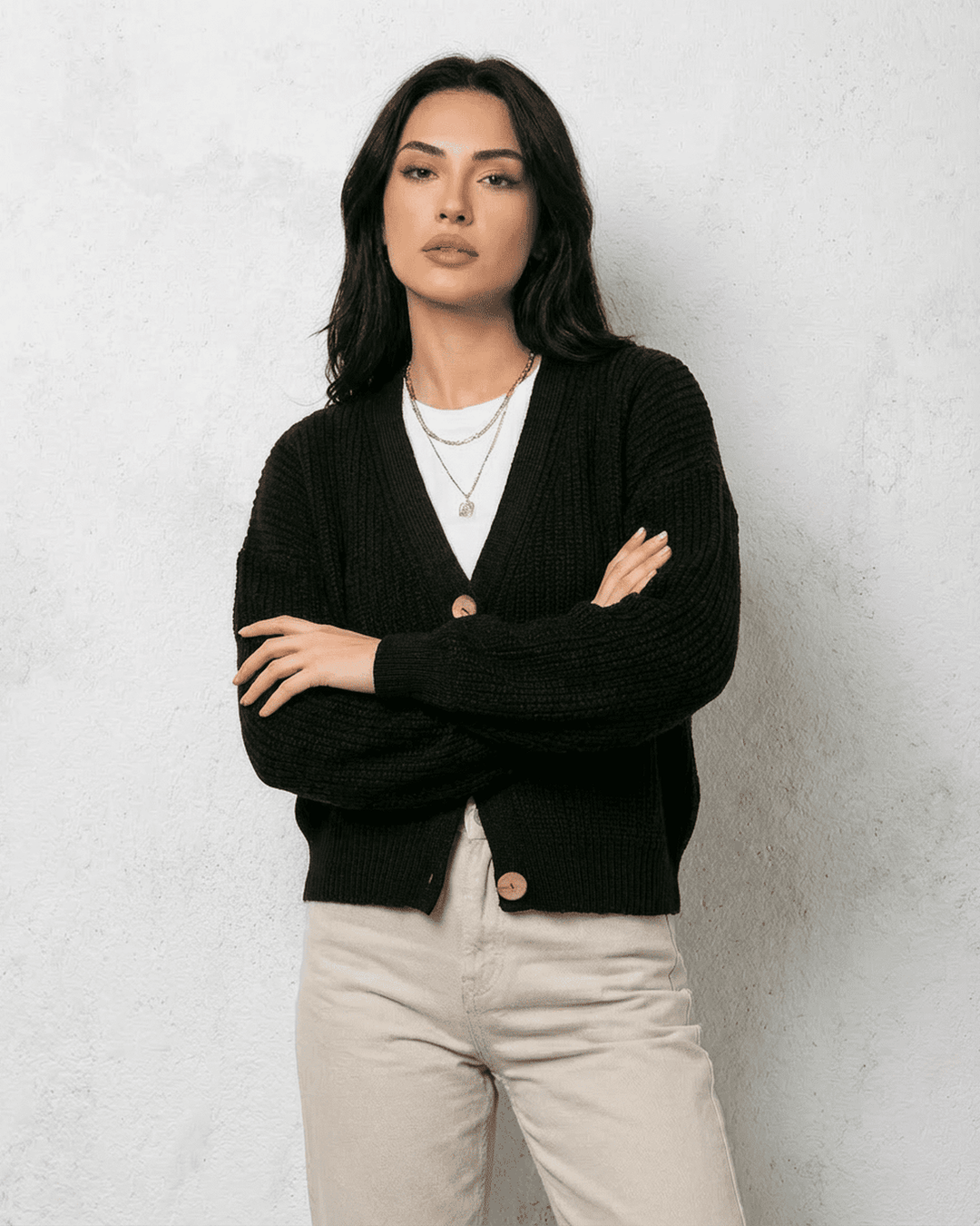 Women's black ribbed knit cardigan with V-neck and button front