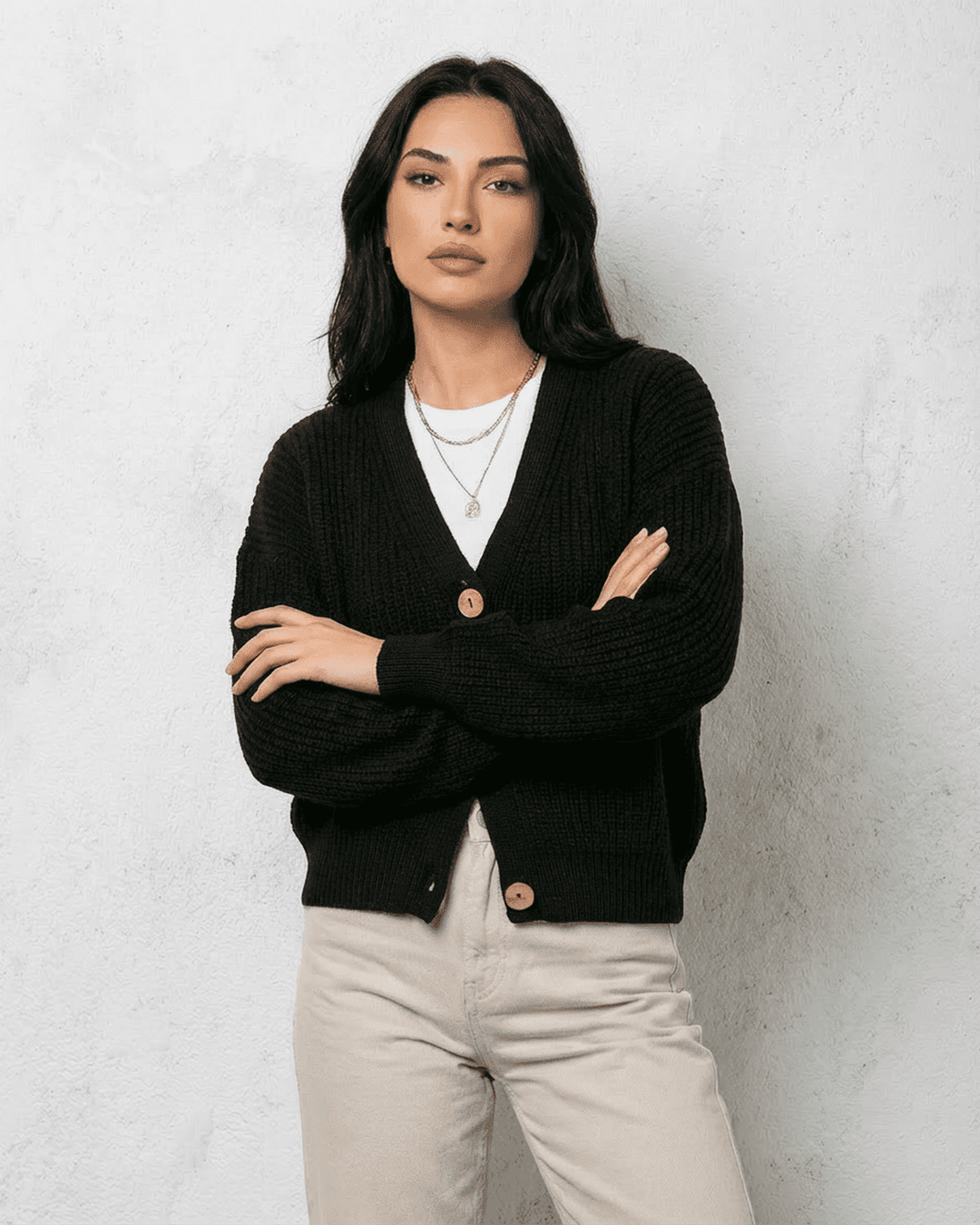 Women's black ribbed knit cardigan with V-neck and button front
